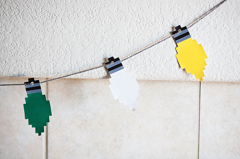 Free printable pixelated lights from All for the Boys blog. Perfect for a banner, ornaments or gift tags.