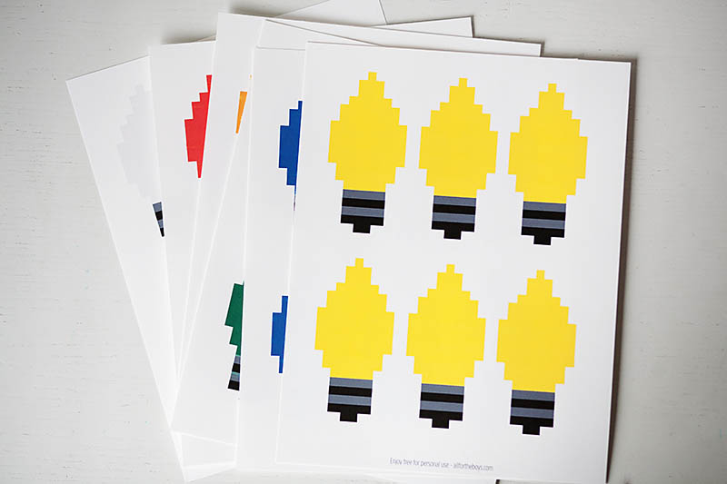 Free printable pixelated lights from All for the Boys blog. Perfect for a banner, ornaments or gift tags.