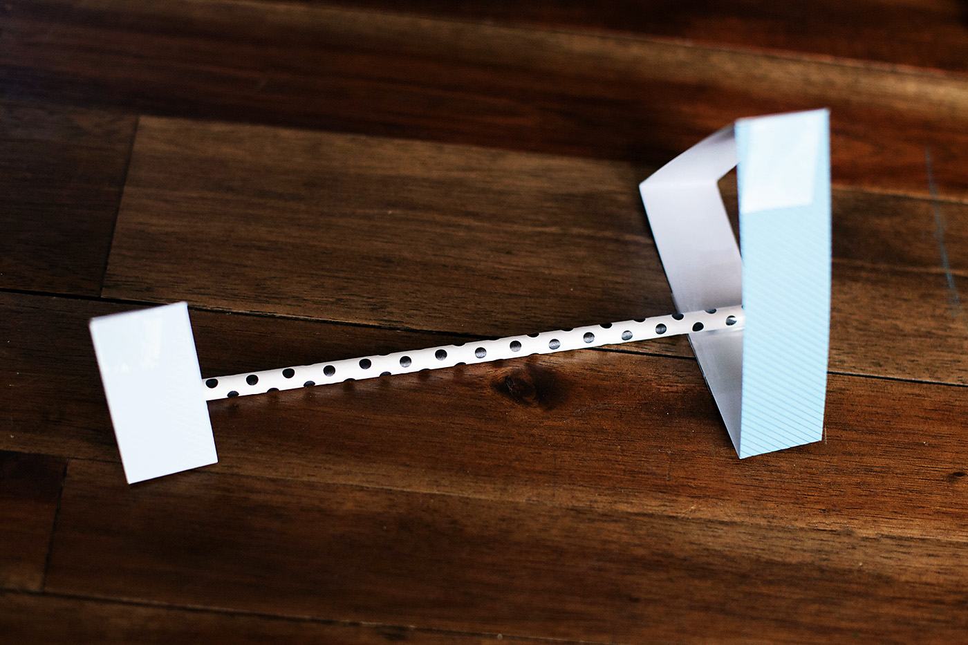 Straw planes made with different shapes. So easy to make out of a straw, paper and tape!